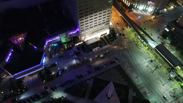Tilt up to reveal Downtown Miami aerial drone video at night 4k prores