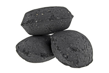 Charcoal briquettes on white background