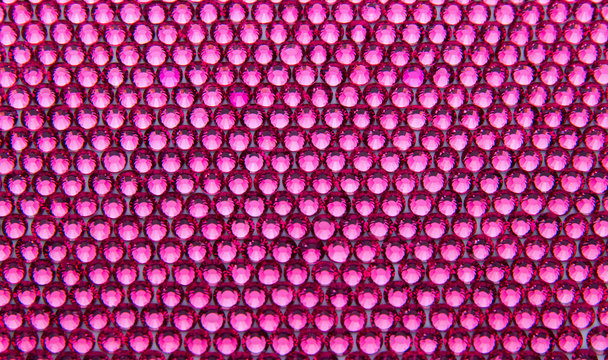 Canvas of rose rhinestones. Background.