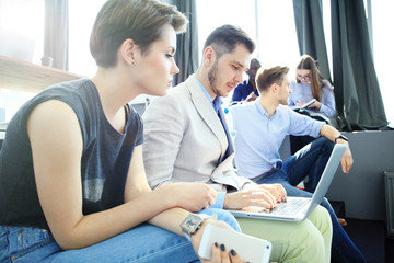 Fototapeta premium Startup Diversity Teamwork Brainstorming Meeting Concept.Business Team Coworkers Analyze Finance Report Laptop.People Working Start Up Process.Group Young Hipsters Discussing Office.