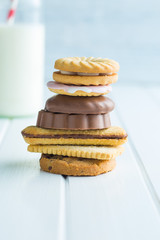 Various sweet biscuits and milk.