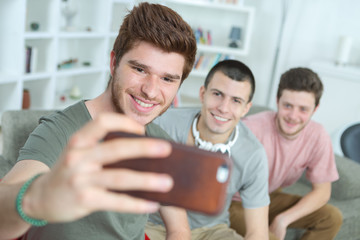 the friends taking selfie