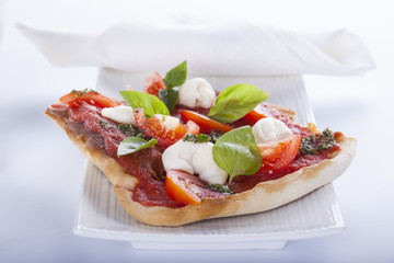 pizza pomodoro, vegetarian and homemade isolated on white background