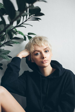 Young Woman In Black Hoodie