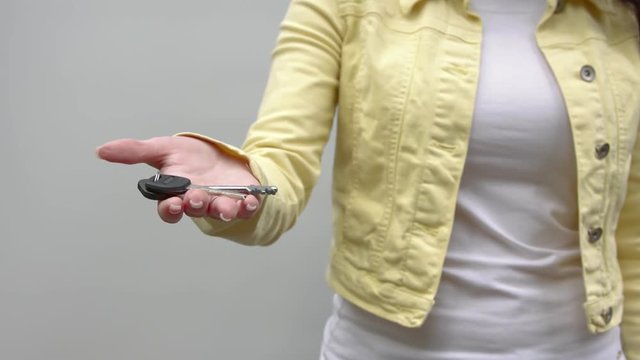 The keys extended on a palm