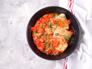 White sea fish stewed with onion, red pepper, tomatoes, garlic, coriander and cumin.