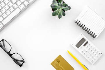 accountant work desk with credit card and notebook for online payment white background top view...