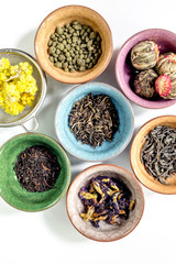 herbal and green tea for tea-house white desk background flat lay pattern