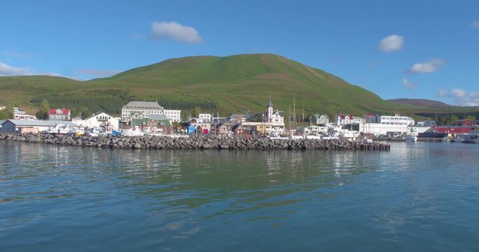 HUSAV&Iacute;K, ICELAND &ndash; SEPTEMBER 2016 : Aerial shot of Husav&iacute;k Bay on a beautiful day with boats and ships in view