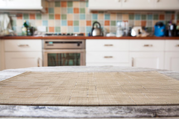 blurred kitchen interior and napkin and desk space