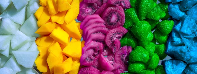 Foto op Plexiglas quatre ensemble de fruits de couleurs originales et transformées © Olivier Tabary