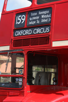 Section on red London bus showing Oxford Circus on it's window route