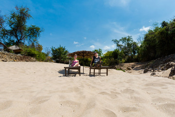 Tourists on Li Phi waterfall