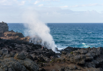 Fototapeta na wymiar Nakalele Blowhole on north coast of Maui erupts