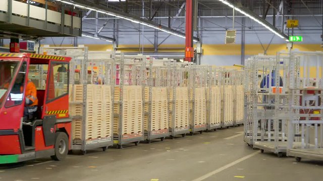 836_A_very_long_cart_train_with_boxes_on_the_load.mov