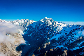 A Wide Panorama of Snowy Mountains, Southern Alps located in south island, in New Zealand