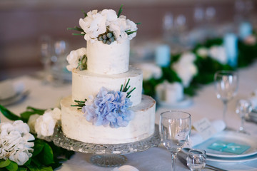 Wedding cake on the wedding table.