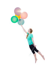 Fototapeta na wymiar Young Girl Being Carried Up and Away By Balloons That She Is Holding Isolated On A White Background.