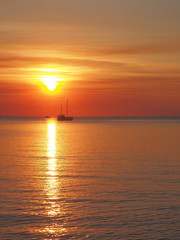 Sunset with boat and sun at Fannie bay, Darwin 2017