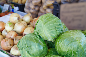 Fototapeta na wymiar Cabbage, onions on the market