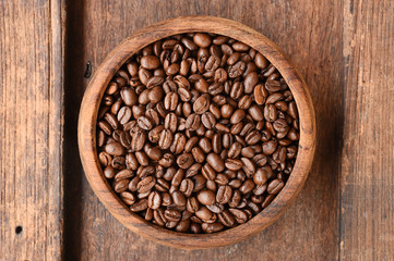 Freshly coffee beans in  bowl for background