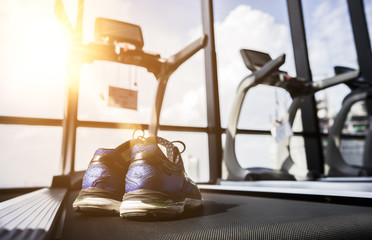 Fototapeta na wymiar Running shoes on the Treadmill