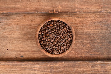 Freshly coffee beans in  bowl for background