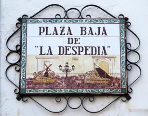 Street sign in lower square of Andalusian village