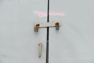 close up on locked iron gate background