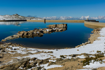 Landscape on lake Lagoa Comprida with snow in the Serra Da Estrela Mountains. County of Guarda. Portugal