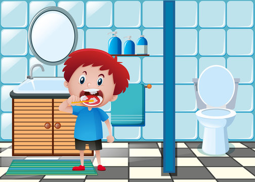 Boy brushing teeth in toilet