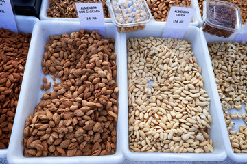 Different types of delicious nuts for sale at Sunday market in Spain, Mercadillo de Campo de Guardamar