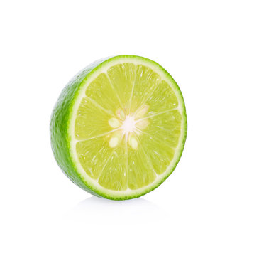 A half of fresh lime fruit isolated on a white background.