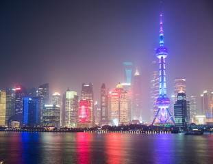 Fototapeta na wymiar shanghai skyline in mist night
