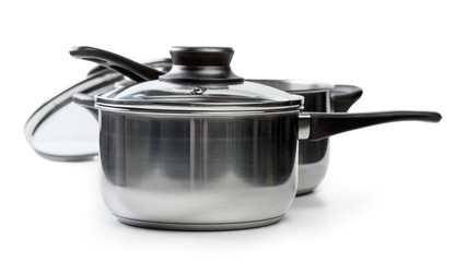 Stainless steel pots and pans isolated on white