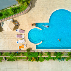 Top view of people near the pool