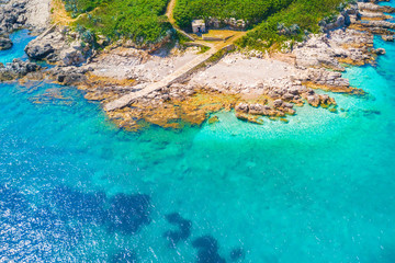 Top view of a stone road to the sea