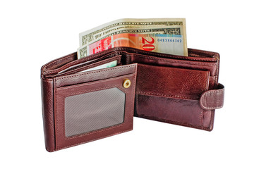 Open brown leather wallet with money isolated on white background