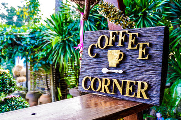 Fototapeta na wymiar Wooden handmade coffee corner board at coffee shop in holiday time.