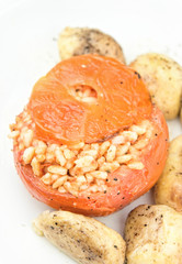 Rice stuffed tomatoes with potatoes