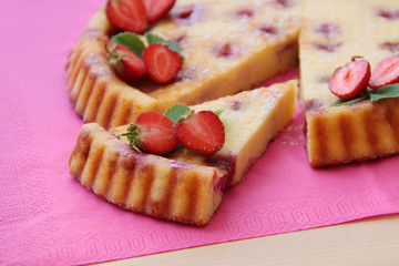 Fruity pie. Strawberry tart decorated by fresh fruits. Close up view.