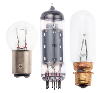 three old electric lamps on white