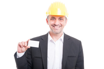 Portrait of architect showing blank business card