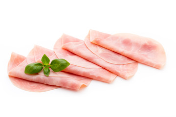 Thin slices of ham on white background.