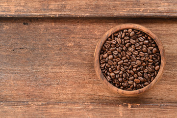 Freshly coffee beans in  bowl for background