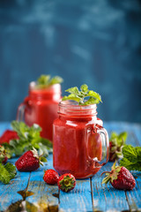 Strawberry smoothie in jars