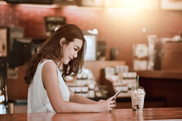 Beautiful Woman are using tablet on the white blackground,Smiling young women using digital tablet in the office,Happy young woman with tablet pc laying on standing