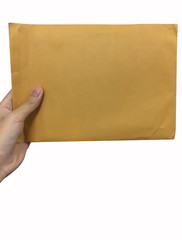 Hand hold brown envelope isolated on white background
