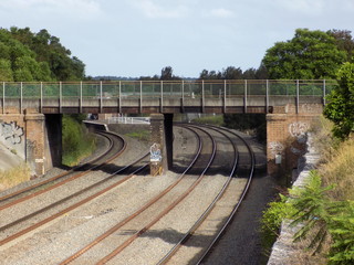Railway tracks and brick bridge