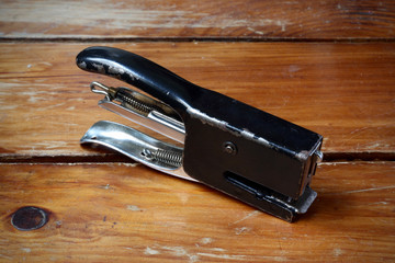 Stapler on the Wood Table